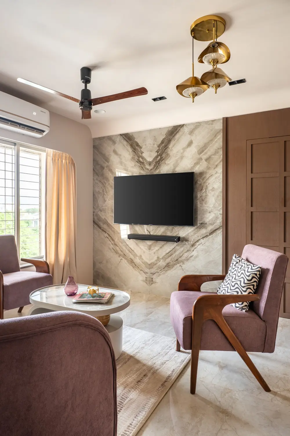 Living room with a marble TV wall