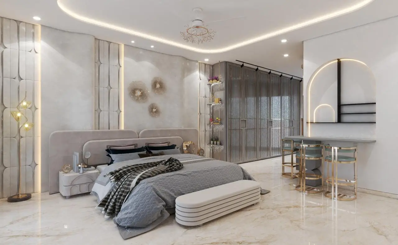 Visual of a bedroom with a grey bed and a gold-edged arch mirror