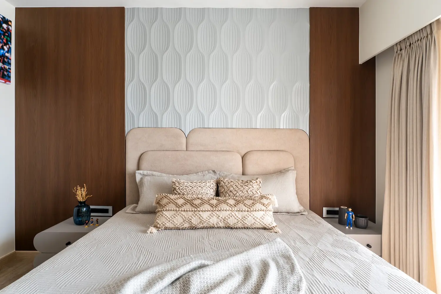 Casa Umber bedroom with a scalloped relief headboard wall